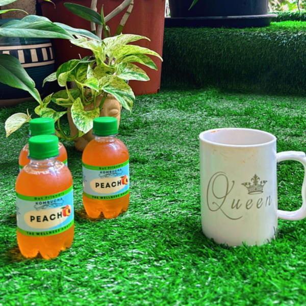 Peach Kombucha – Probiotic-rich, refreshing drink for digestion and immunity. Healthy, flavorful kombucha with natural peach essence
